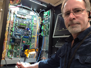 On the Manulife project I served as network architect in addition to project manager.  Here I'm installing my networking hardware and media into ThyssenKrupp's GAL Elevator Controller at the top of one of the elevator shafts at Manulife bank in Waterloo, Ontario, Canada.  We manfactured and installed 4 video wall elevators.